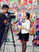 世界杯热度蹭一波，水墨为游客彩绘国旗助力比